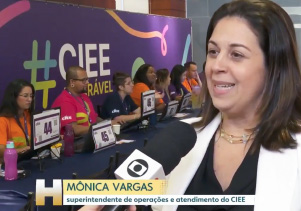 Foto da Superintendente Monica Vargas dando entrevista para a Globo